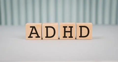 ADHD Abbreviation on ADHD cubes on a light background. Close ADHD - Attenti.. Stock Photos