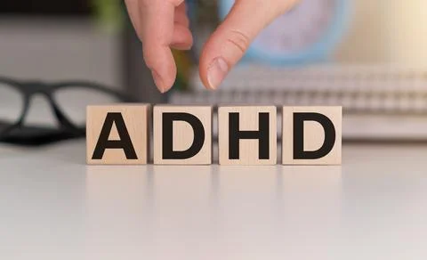 ADHD Abbreviation on ADHD cubes on a light background. Close ADHD - Attenti.. Stock Photos