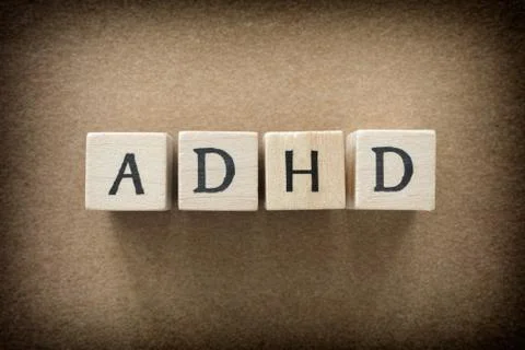 ADHD abbreviation on wooden blocks Stock Photos