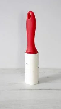 Adhesive lint roller, the device used to remove small dust or fibers on the m Stock Photos