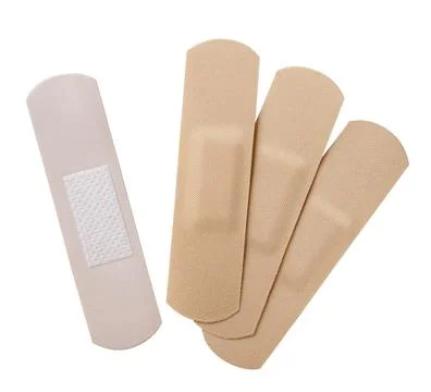 Adhesive plasters close-up on a white. Isolated Stock Photos