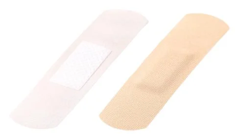 Adhesive plasters on a white background. Isolated Stock Photos