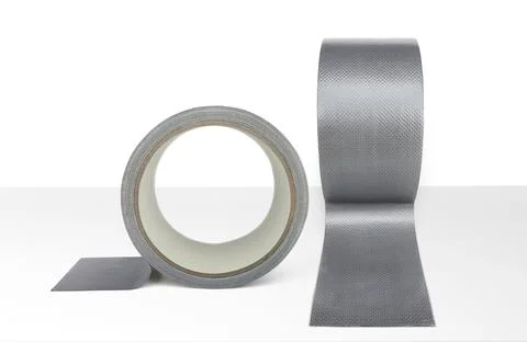 Adhesive tape on white table Stock Photos