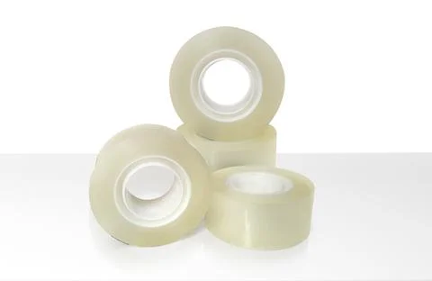 Adhesive tape on white table Stock Photos