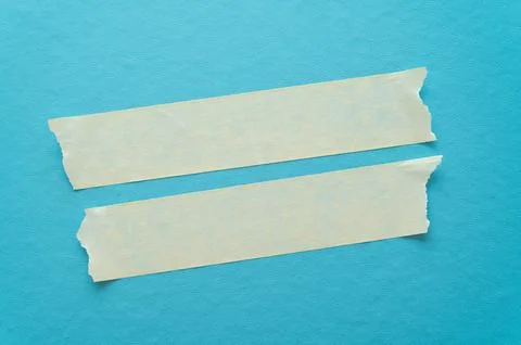 Adhesive tapes on a light blue background – texture with creases and contrasts Stock Photos