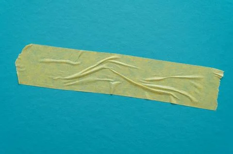 Adhesive tapes on a light blue background – texture with creases and contrasts Stock Photos