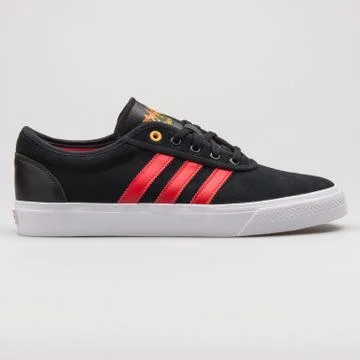 Adidas Adi Ease black, red and white sneaker Stock Photos