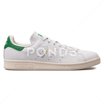 Adidas Stan Smith white and green sneaker Stock Photos