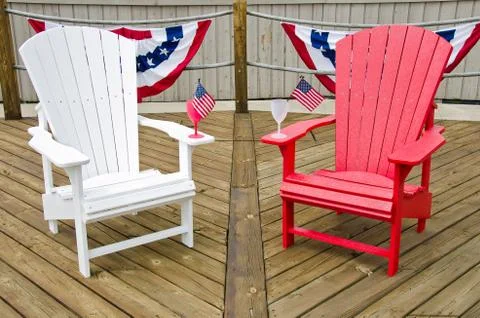 Adirondack chairs with flags Stock Photos