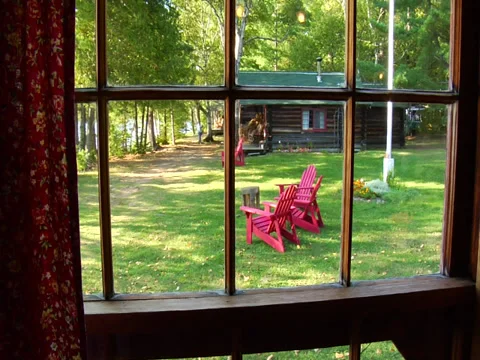 Adirondack chairs on lawn Stock Footage 28375283