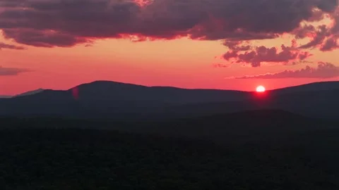 Adirondack Mountain layers Schroon Lake vibrant sunset golden hour red fire sun Stock Footage 342585575