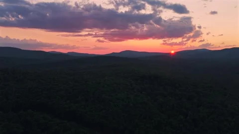 Adirondack Mountain layers Schroon Lake vibrant sunset golden hour red fire sun Stock Footage 342587293