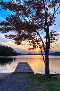 Adirondacks Dock Sunset Foto stock
