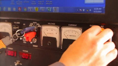 Adjust amperage output with volt and ac meter Stock Footage 125872526