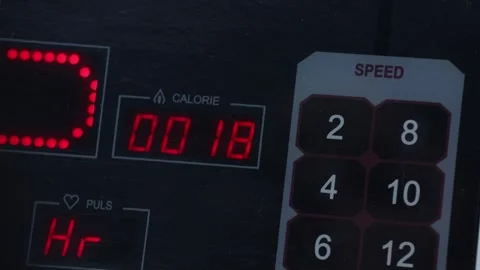 Adjust settings on gym equipment 4 Stock Footage 309552466
