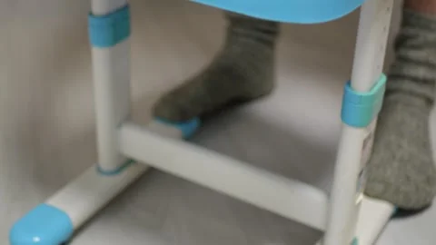 Adjustable Blue High Chair for Ergonomic Support and Posture Correction at Stock Footage 330955723