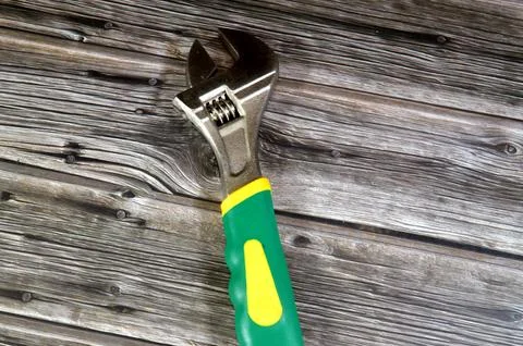 Adjustable crescent wrench spanner, a versatile hand tool with a movable ja.. Stock Photos