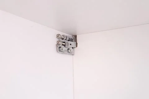 Adjustable fasteners for kitchen drawers to the wall Stock Photos