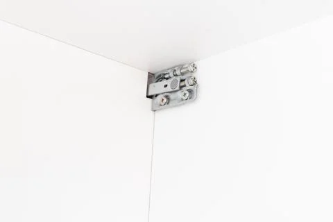 Adjustable fasteners for kitchen drawers to the wall. Stock Photos