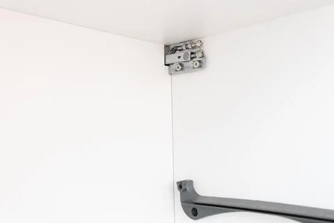 Adjustable fasteners for kitchen drawers to the wall Stock Photos