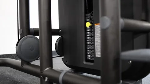 Adjustable gym weight stack for progressive resistance training Stock Footage 337346687