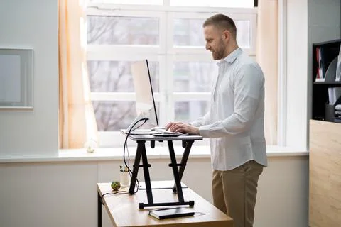 Adjustable Height Desk Stand Stock Photos