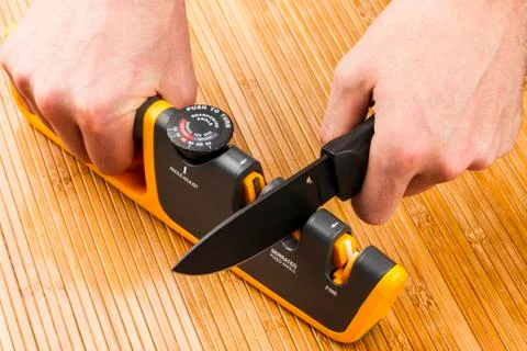 Adjustable manual knife sharpener Stock-Fotos