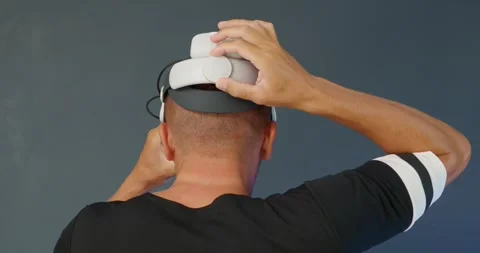 Adjustable size on Virtual Reality headset on head. back view. Stock Footage 257598716