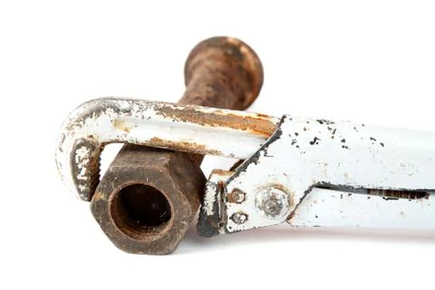 Adjustable spanner and rusty bolt with a nut Stock Photos