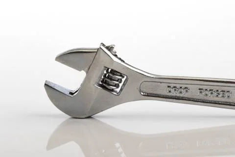 Adjustable spanner isolated on a white background Stock Photos