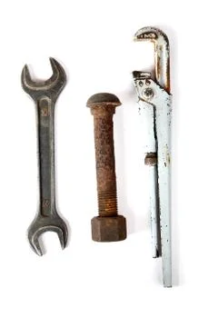 Adjustable spanner,wrench and rusty bolt with nut Stock Photos