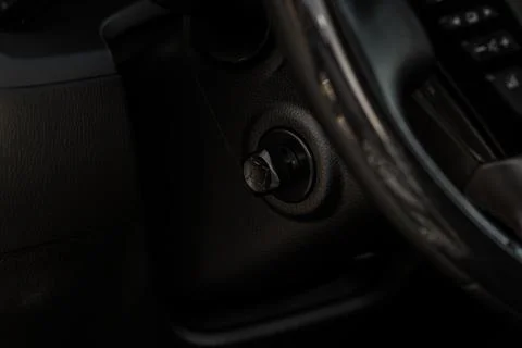 Adjustable steering wheel in modern car. Tilt and telescopic steering control Stock Photos