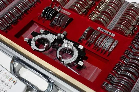 Adjustable trial frame in lens case for storing and transporting set. Trial s Stock Photos