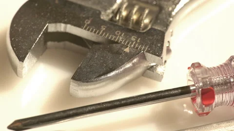 An adjustable wrench and a screwdriver Stock Footage 60057167