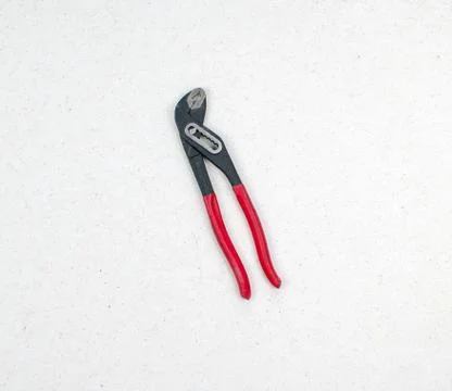 Adjustable wrench isolated on a light background. Iron spanner for repair. Stock Photos