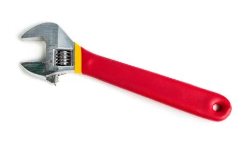 Adjustable wrench with red rubberized handle Stock Photos