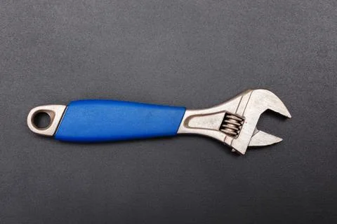 Adjustable wrench tool on black 스톡 사진