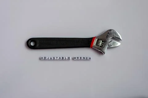 Adjustable Wrench on White Background with name Stock Photos
