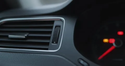 Adjusting the air flow power in a car deflector. Video included audio. Stock Footage 322004316