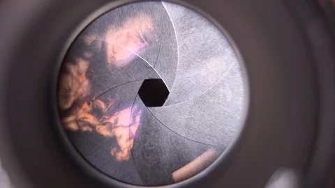 Adjusting aperture camera lens close up. Stock Footage 108986993