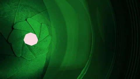 Adjusting aperture on camera lens. Close up view. Iris blades open close slowly Stock Footage 252817544