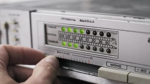 Adjusting Balance on Amp with LED Output Level Stock Footage 318163419
