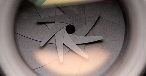 Adjusting Camera Lens aperture Stock Footage 87992823