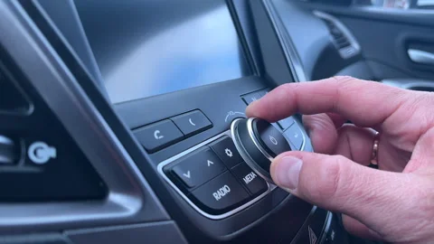 Adjusting Car Audio Volume Stock Footage 308858681
