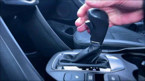 Adjusting Car Gear to Drive Video stock 308858648