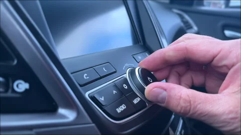 Adjusting Car Stereo Volume Stock Footage 308858698