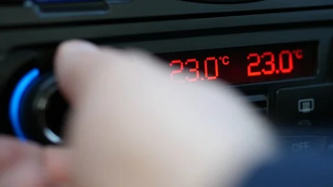 Adjusting climate celsius on car AC Stock Footage 88827857
