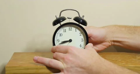 Adjusting clock back by one hour, dst end Stock Footage 152116072