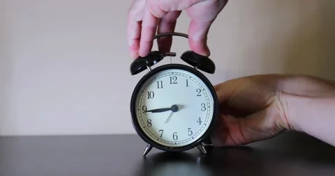 Adjusting clock back one hour, dst end, Stock Footage 167190485