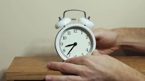 Adjusting clock back by one hour, dst end Stock Footage 249965548